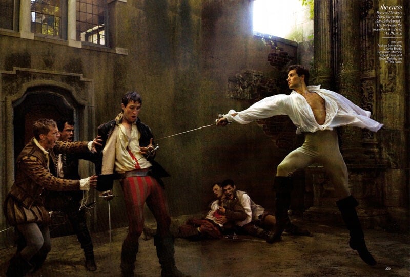 Magazine editorial page: actors in Renaissance costume stage a sword fight in a stone courtyard